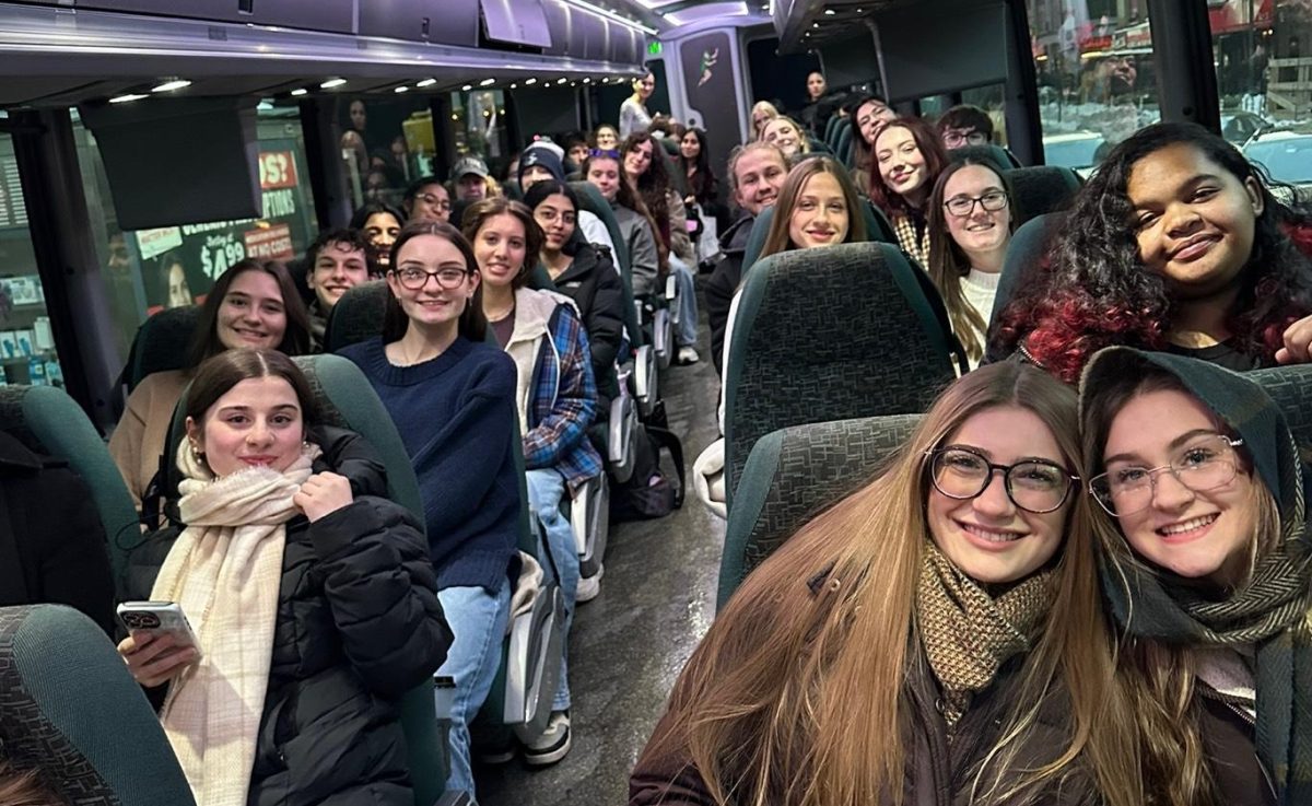 English trip students on the coach bus